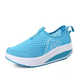 Mesh wedge heel shoe